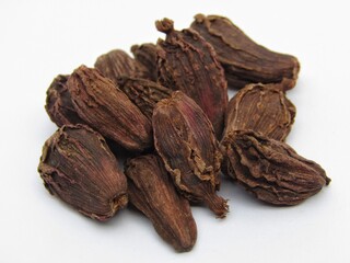 Black cardamom isolated on white background 