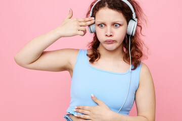 Fototapeta premium pretty woman with headphones entertainment music emotion unaltered