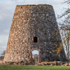 abandoned mill stone masonry building without doors