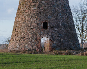 abandoned mill stone masonry building without doors