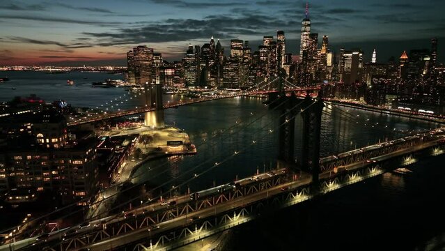 alt dusk flying over Manhattan Bridge towards downtown NYC
