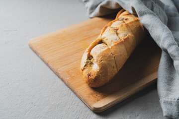 Freshly baked homemade bread with crispy crust and garlic