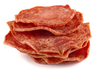 A stack of meat chips is isolated on a white background. Full clipping path.