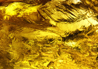 Beautiful golden (yellow) background. The texture of natural stone. macrophoto citrin.