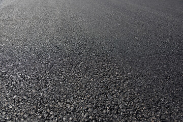 Asphalt road low angle pavement background view