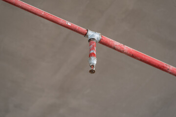 Close-up of metal fire pipes and sprinklers on roof