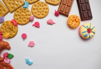 Toys different sweets, on a white background