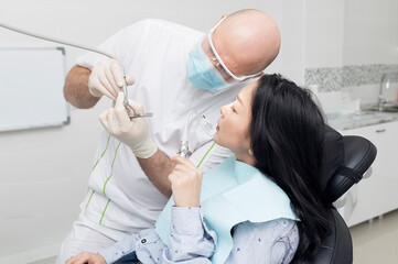 dentist and patient in dental office