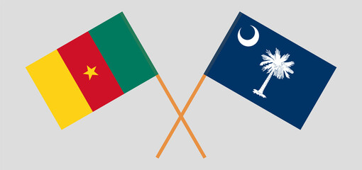 Crossed flags of Cameroon and The State of South Carolina. Official colors. Correct proportion