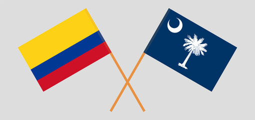 Crossed flags of Colombia and The State of South Carolina. Official colors. Correct proportion