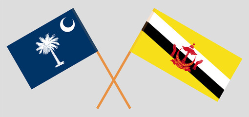 Crossed flags of The State of South Carolina and Brunei. Official colors. Correct proportion