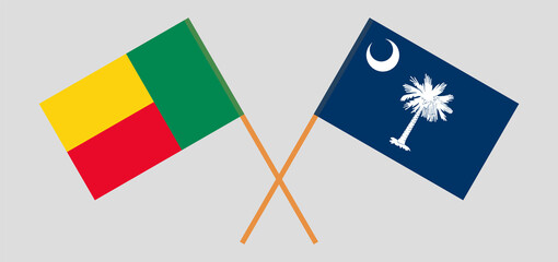 Crossed flags of Benin and The State of South Carolina. Official colors. Correct proportion