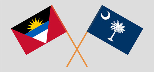 Crossed flags of Antigua and Barbuda and The State of South Carolina. Official colors. Correct proportion
