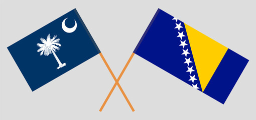 Crossed flags of The State of South Carolina and Bosnia and Herzegovina. Official colors. Correct proportion