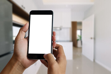 Cropped shot of a woman using blank screen tablet