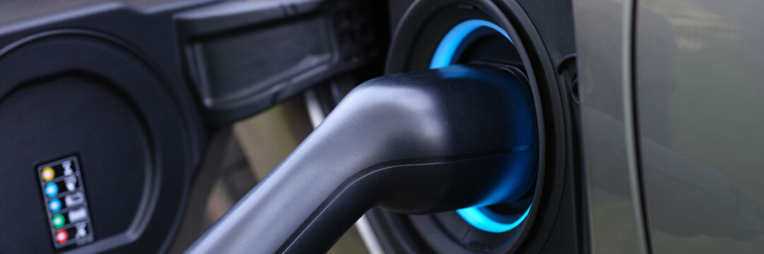 Electromobile charging plug is inserted into vehicle charging socket