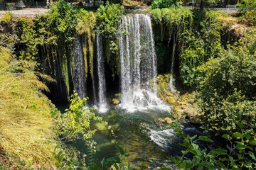 Fototapeta na wymiar Summer landscape with big waterfall. Duden waterfalls in Antalya. Opposite top view.
