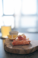 Delicious peeled crab legs with lemon and ginger beer