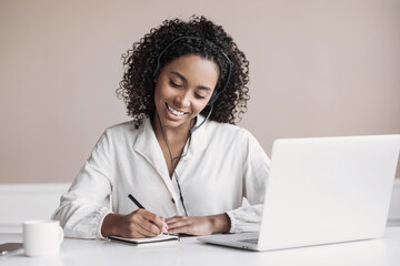 Distance studying, e-learning concept. Woman using laptop computer at home, study online. Student...