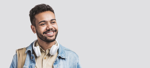 Closeup portrait of handsome smiling young man. Laughing joyful cheerful men isolated studio shot....