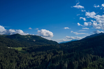 Panorama of beautiful countryside of Italy. High mountains in the Europe. Landscape with mountain pastures.