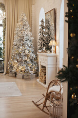 Cozy chalet lodge home interior with christmas tree and fireplace - luxury house inside on holiday background. Christmas tree and fireplace at home in luxury chalet or lodge home interior design.