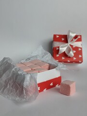 pink craft marshmallow in the red box with hearts