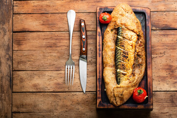 Mackerel baked in bread loaf