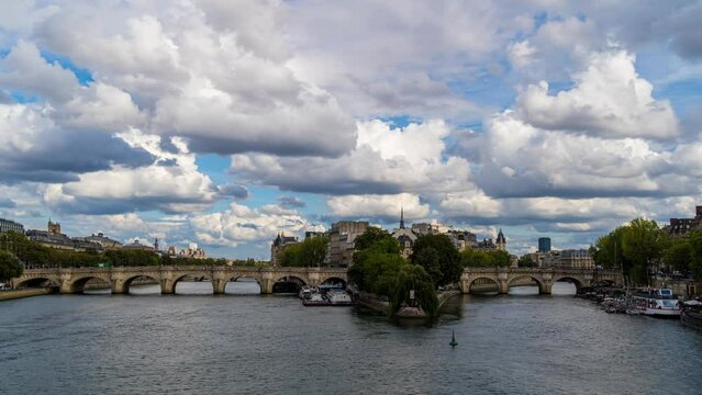 Sunny and Cloudy Day over Paris Center Seine River and Bridges Boats Architecture Trees