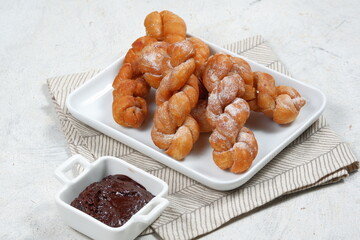 Korean Twisted doughnuts (donut) or Bread Stick, Wang kkwabaegi (kkwabaegi ) also known in the...