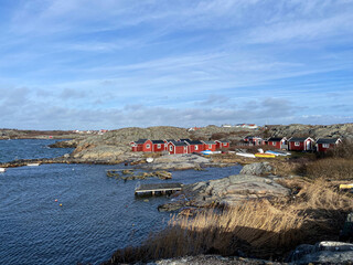 Swedish, Scandinavian village near the North Sea coast with red fishermen's houses, a windmill and boats - Gothenburg, Hono, Sweden