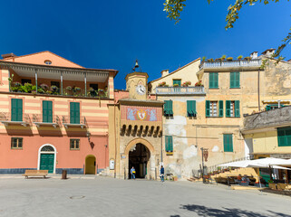 Fototapeta na wymiar Finalborgo, Finale Ligure, Italy. May 5, 2021. View of the facade of the ancient Porta Testa.