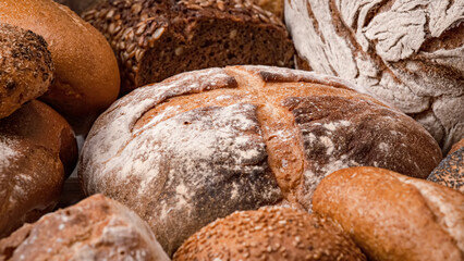 Freshly baked natural bread is on the kitchen table.