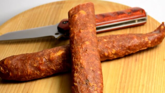 smoked Polish sausage on a turn table