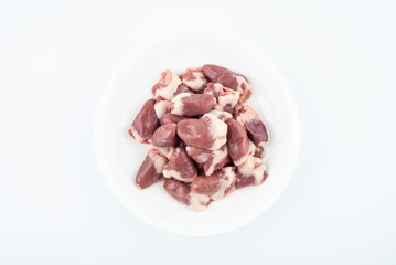 A plate of fresh chicken hearts