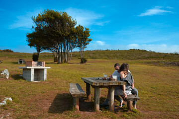 couple having breakfast in nature