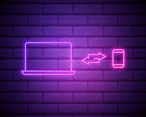 synchronize smart phone with laptop icon in neon style. One of Mobile banking collection icon can be used for UI, UX. Brick wall.