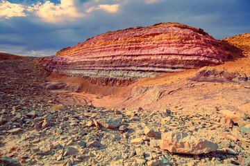 Mountain desert landscape. Colorful sandstone mount in  National Park Makhtesh Ramon Crater in...