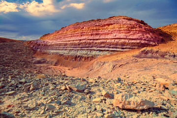 Mountain desert landscape. Colorful sandstone mount in  National Park Makhtesh Ramon Crater in Negev desert, Israel