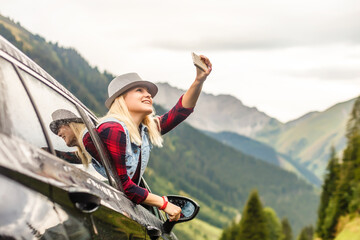 cars with bicycles in the mountains © Angelov