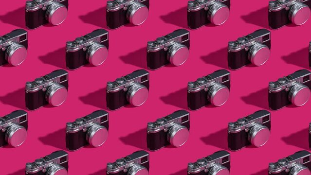 Retro Camera Pattern Animation on Pink Background