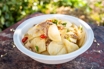 Chinese home-cooked fried pork with cold potato