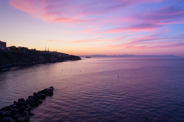 Colorful sea sunrise in calm summer day, Piombino, Tuscany