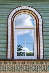 window with carved platbands