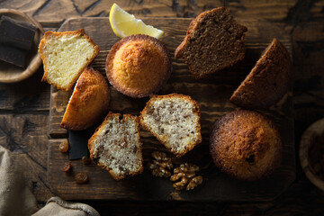 Homemade assorted muffins with lemon, cinnamon and nuts