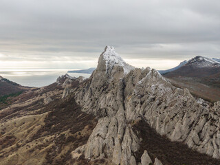 Fototapeta premium Coastal mountains covered in snow