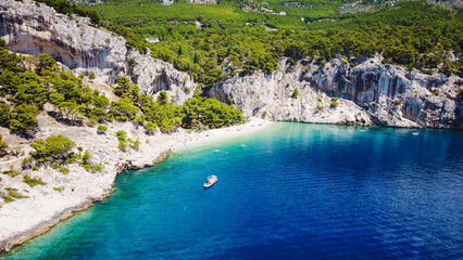 This is a beautiful coastal beach in Makarska, Croatia. The turquoise waters embrace the sun-kissed...