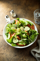 Healthy vegetable salad with tomato and cucumber