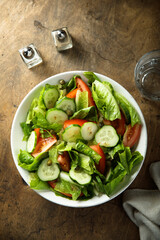 Healthy vegetable salad with tomato and cucumber