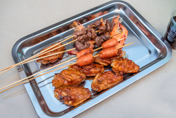 A plate of BBQ food and drinks